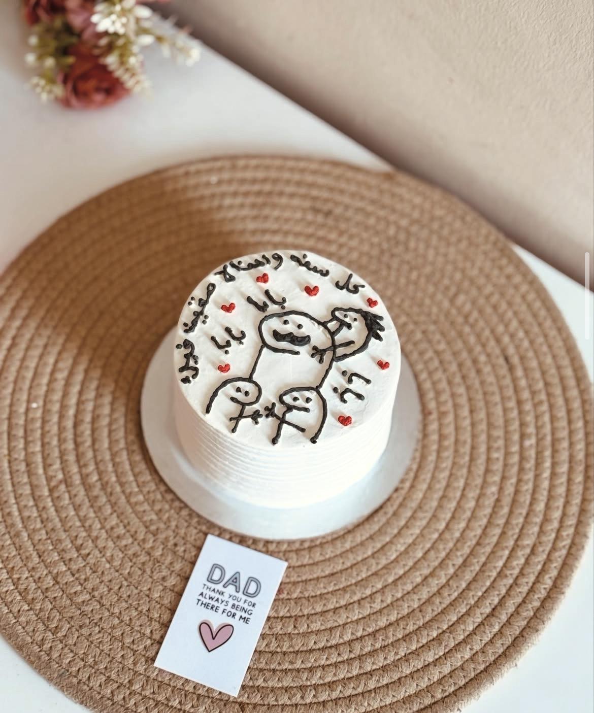 Custom bento cake with Arabic calligraphy and line-art characters
